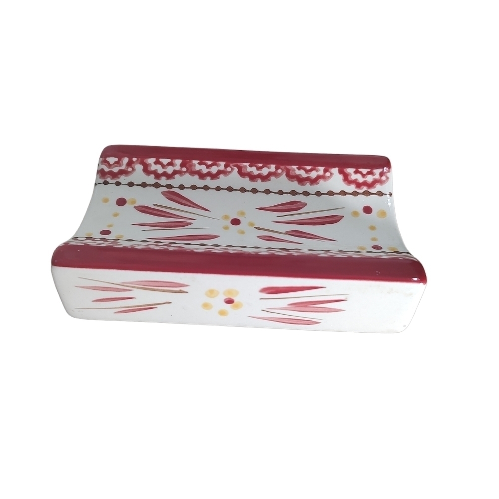 Temptations presentable ovenware rolling pin rest